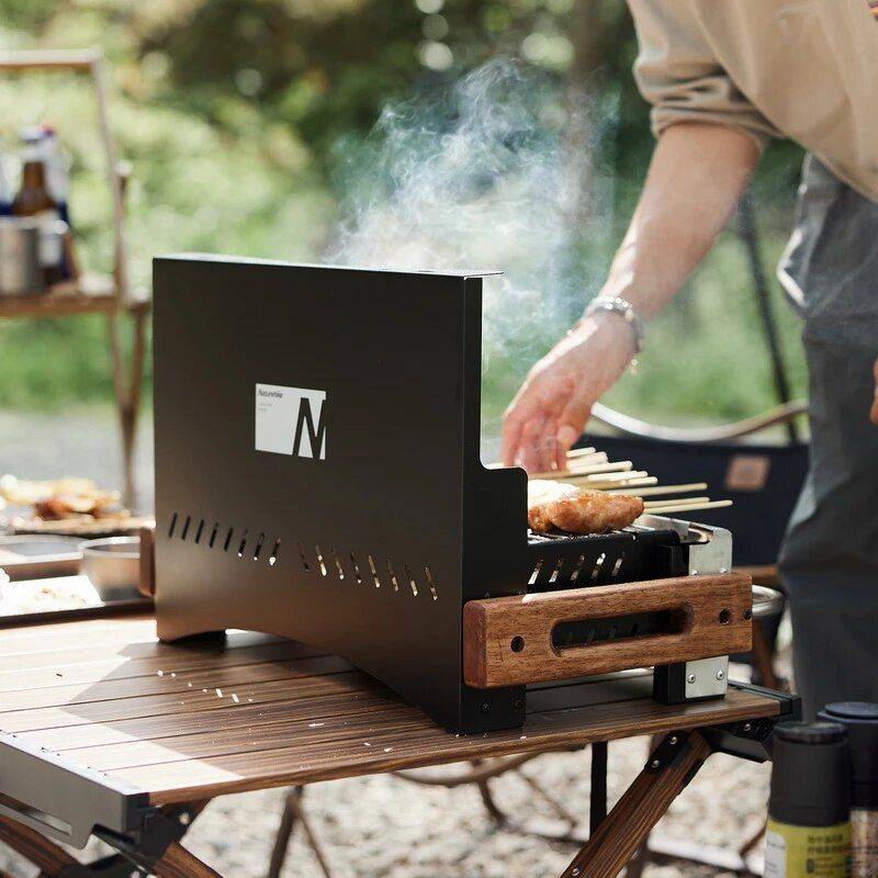 Compact Folding Portable Charcoal Grill for Outdoor Camping and Picnics Road Trip Accessories Color : Black Compact Folding Portable Charcoal Grill for Outdoor Camping and Picnics Road Trip Accessories Color : Black